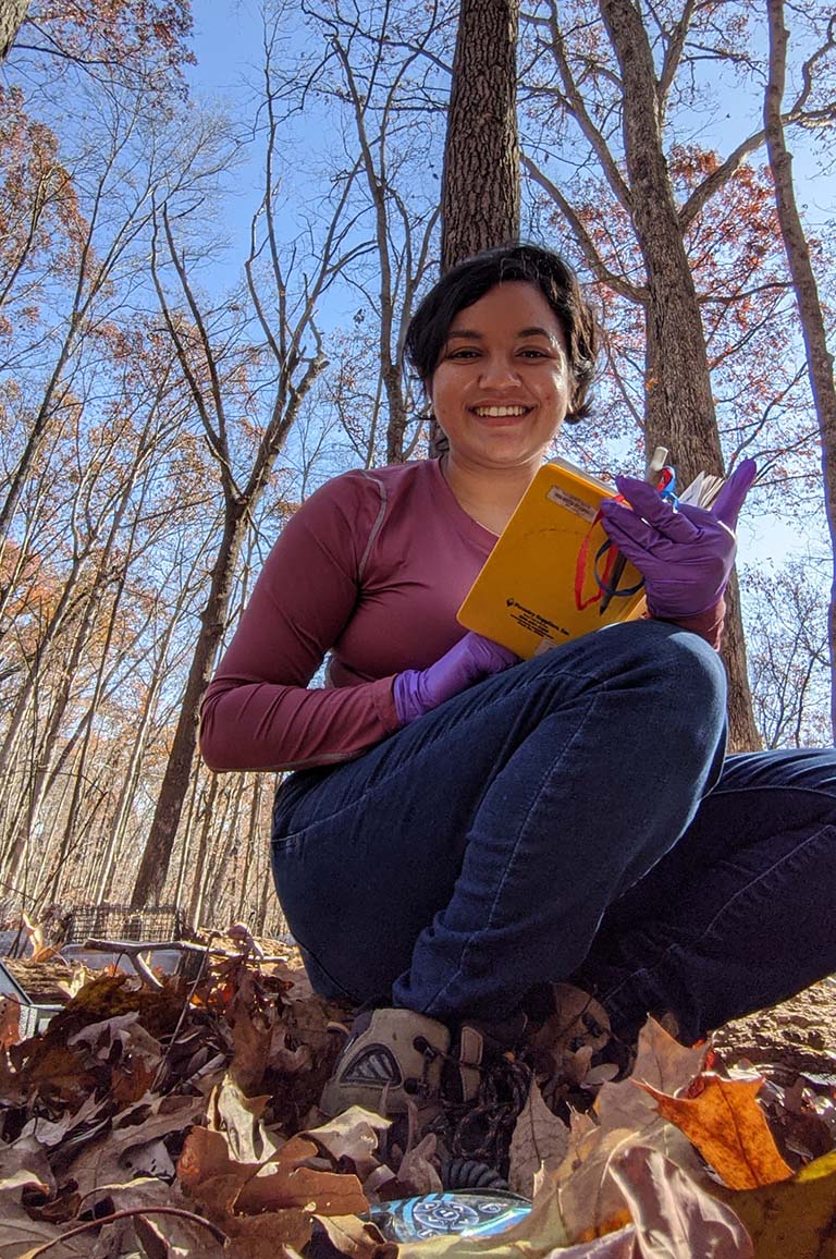 Ashwini Ramesh at her research field site at the IU Research and Teaching Preserve Moores Creek property.