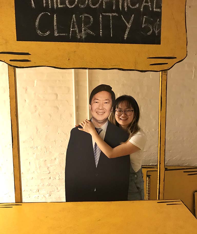 Joy Seo poses with a life-size cutout of comedian and actor Ken Jeong.