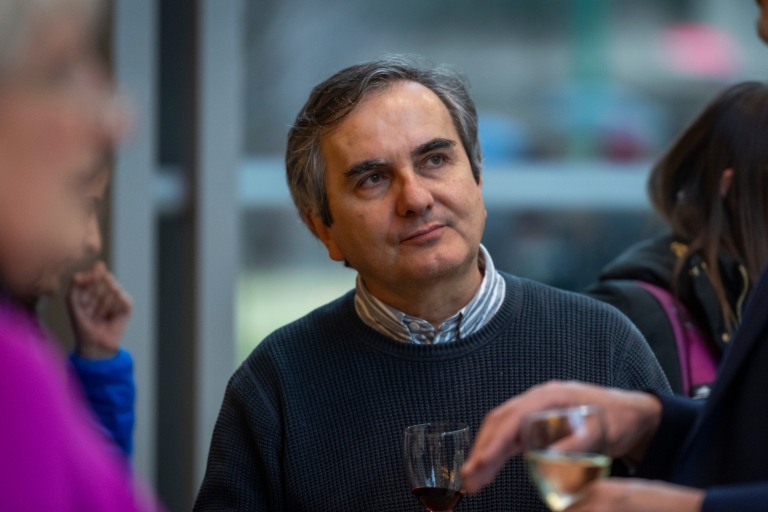 Frédéric Partensky speaks with fellow guests during a reception at IU's Hamilton Lugar School of Global and International Studies following the signing of agreements between IU and Sorbonne University.