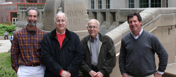 Roger Innes, Joel Sagalowsky, Howard Sagalowsky, and Clay Fuqua pose for a photo in front of Simon Hall on the IU Bloomington campus on May 16, 2011.