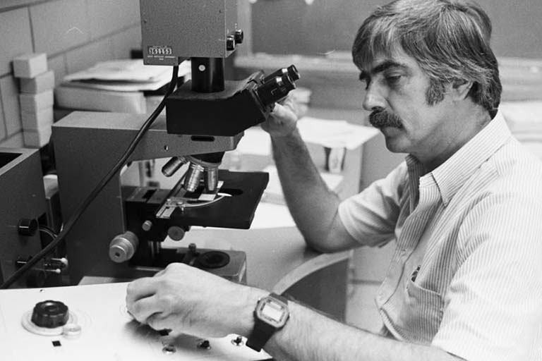 Don Whitehead testing for acid rain, July 1982.  Photo courtesy of IU Archives, #P0067135.