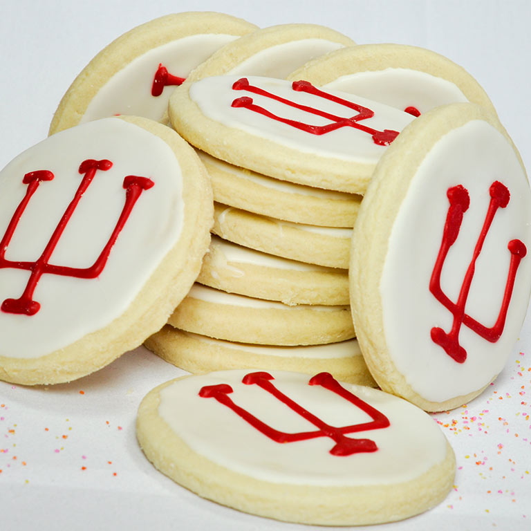 Cookies from the IMU Sugar and Spice shop with white icing decorated with red IU logo.